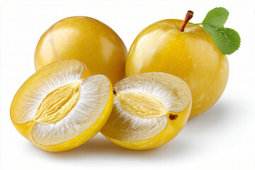 Halved and whole yellow plums isolated on white background