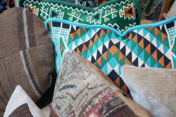 Decorative pillows with vibrant patterns in cozy setting