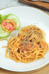 Pasta spaghetti bolognese with minced beef sauce and tomatoes, one of the restaurant menus in Jakarta