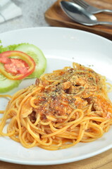 Pasta spaghetti bolognese with minced beef sauce and tomatoes, one of the restaurant menus in Jakarta