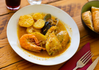Bowl of traditional catalonian meal Casuela de San pedro