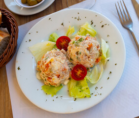 Appetizing Olivier salad with eggs, greens, vegetables, lettuce and mayonnaise. Spanish cuisine