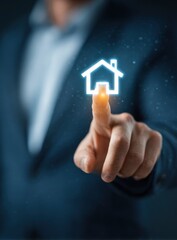 Businessman's Finger Activates a Luminous House Icon on a Virtual Interface.