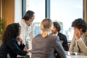 Leadership training, executive communication and team development in progress with diverse...