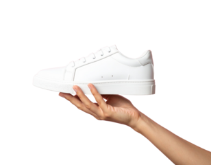 An - Female Hand Holding Minimal White Sneaker, Side View, Isolated on Transparent Background.