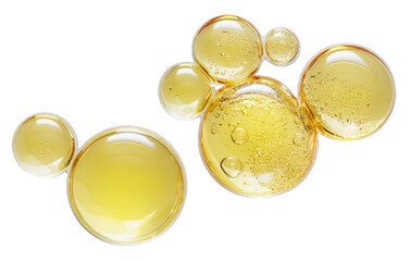 golden oil bubbles on white background