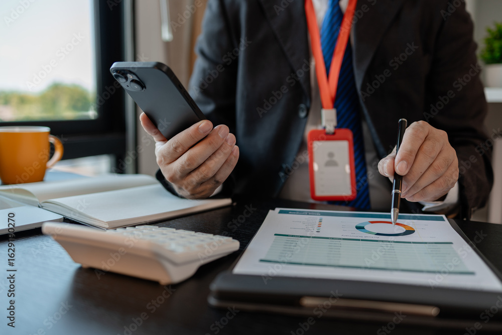 Poster a businessman woks with a foreign company and uses a smartphone to help send and receive information
