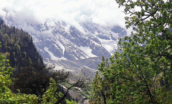 scenic mountain landscape, snowcapped himalaya and lush green forest near atal tunnel, manali hillstation in kullu valley in himachal pradesh, india