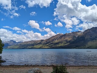 lake in the mountains in summer with blue skies