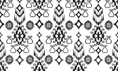 Seamless geometric ethnic pattern in black and white. Abstract hand drawn retro texture.