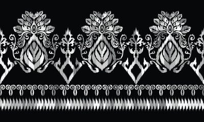 Seamless geometric ethnic pattern in black and white. Abstract hand drawn retro texture.