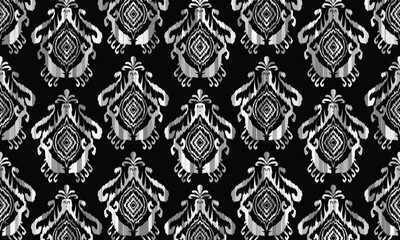 Seamless geometric ethnic pattern in black and white. Abstract hand drawn retro texture.