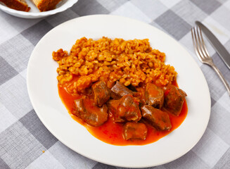Tender pieces of beef in gravy with pearl barley