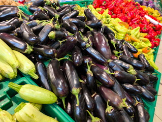 Fresh vegetables on display at a local market showcasing vibrant colors and healthy options during the busy afternoon shopping hours