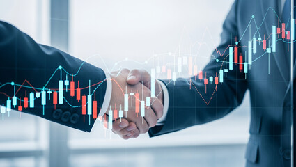 Two people shaking hands with a financial chart overlayed on the image.