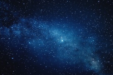 Naklejka premium Starry sky background, blue night sky full of stars, glowing stars in the dark space, starry background, dark night, stars in the distance, starlight, dark background with a blue glow, night sky. 