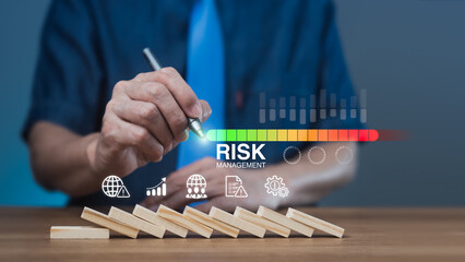 Risk assessment and data-driven decision concept with businessman adjusting risk level meter over...