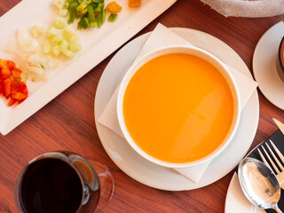 Portuguese and Spanish soup made of raw blended vegetables, gaspacho, served in bowl.