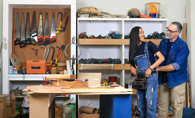 young african american male carpenter worker hold wooden plank at the carpentry workshop	
