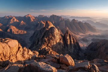 Obraz premium Sacred Peaks of Sinai: A Majestic Vista Bathed in Golden Sunrise Light