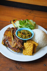 Duck Rice with Green Chili Sambal, Indonesia, captured on August 6, 2025. Steamed rice served with crispy fried duck and a spicy green chili sambal, a bold and flavorful Indonesian specialty