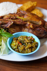 Duck Rice with Green Chili Sambal, Indonesia, captured on August 6, 2025. Steamed rice served with crispy fried duck and a spicy green chili sambal, a bold and flavorful Indonesian specialty