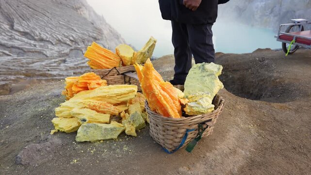 Pieces of Freshly Mined Sulfur Extracted by Hand from Ijen Crater