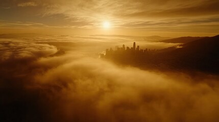 Fototapeta premium City shrouded in golden clouds at sunrise