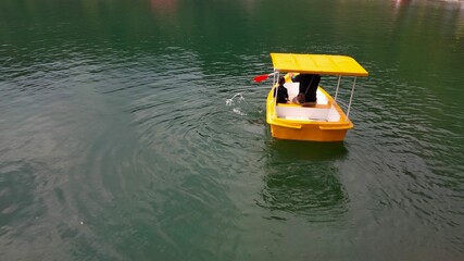 kayak on the lake. kayak on the river. lake in the mountains. canoe on the lake