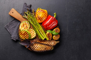 Assorted grilled vegetables including bell peppers, zucchini, eggplant, and asparagus