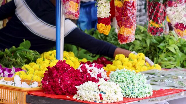 Arranging Marigold Flower Garlands at Little India Market Stall