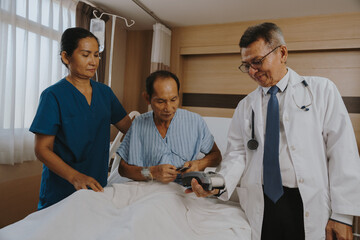 Fototapeta premium Patients are using money and credit cards to pay for medical services after successful treatment.