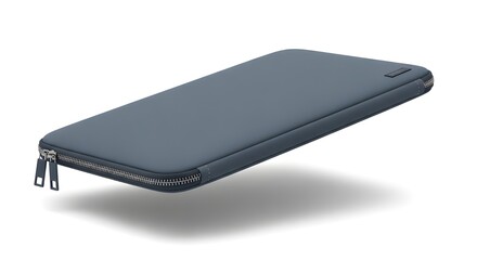 A gray rectangular laptop sleeve with a zipper closure, lying on a white surface.