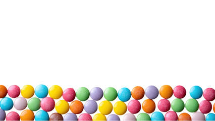 Colorful Candy Buttons Neatly Aligned in Rows on a Black Background