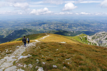 Hikers on a Mountain Ridge