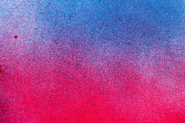 赤色と青色のスプレー塗料で塗った背景	