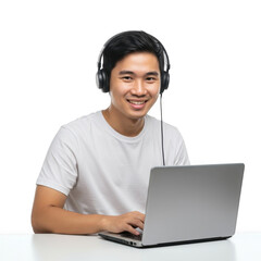 Young asian man wearing headphones smiling while typing on a laptop computer isolated on transparent background