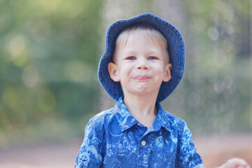 Portrait of a 4-6 year old boy, cute child posing