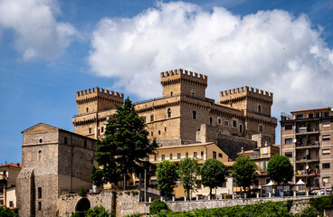 Historic Castle with Towers Against Blue Sky