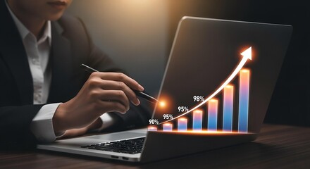 Business professional analyzing upward trending financial growth chart on laptop screen