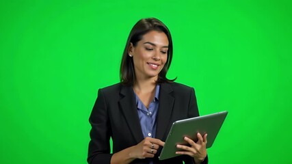 Dynamic Brazilian businesswoman delivers compelling presentation on green screen, perfect for corporate communications and marketing content in 4k.