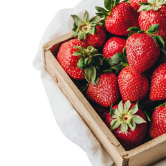 Freshly Harvested Red Strawberries in a Wooden Basket on a White Background