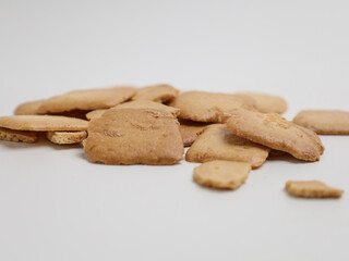 Crispy cheese brownie cookies on white background