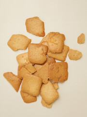 Crispy cheese brownie cookies on white background