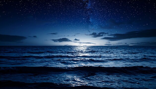 Night sky over a dark ocean - Powered by Adobe