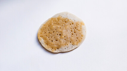 Tasty rice flour pancake or serabi with brown sugar flavor. Indonesian traditional pancake on white background. Close up