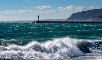 Lighthouse by the Sea with Waves in Almeria