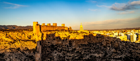Sunset Over Historic Castle and Cityscape in Almeria