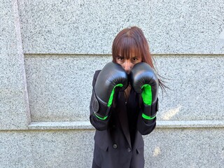 Executive with boxing gloves and fierce look