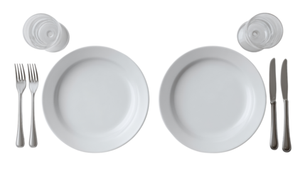 Two empty plates with cutlery on a white background, perfect for settings or dining concepts.